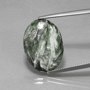 Serafinita verde natural de 9,28 ct, corte óvalo, opaco