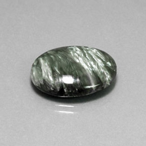 Serafinita verde natural de 11,21 ct, corte óvalo, opaco