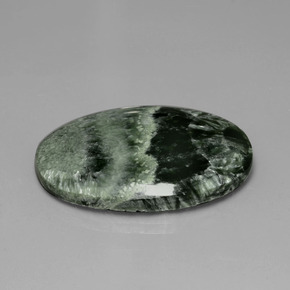 Serafinita Verde natural de 27.31 ct, Corte Óvalo, Opaco