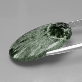 Serafinita verde natural de 28,17 ct, corte óvalo, opaco