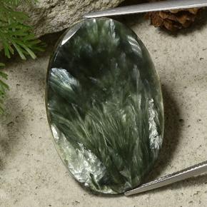 Serafinita verde natural de 33,43 ct, corte óvalo, opaco