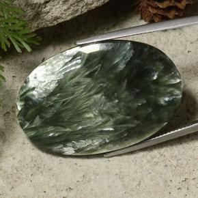 Serafinita verde natural de 33,43 ct, corte óvalo, opaco