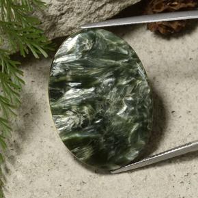 Serafinita Verde terroso natural de 35.44 ct, Corte Óvalo, Opaco