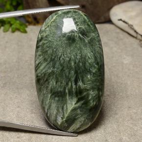 Serafinita verde natural de 56,57 ct, corte óvalo, opaco