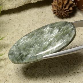 Serafinita verde natural de 23,88 ct, corte óvalo, opaco
