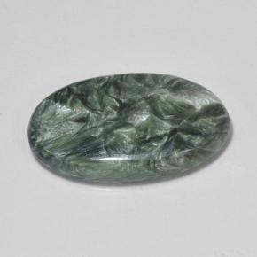 Serafinita verde natural de 7,09 ct, corte óvalo, opaco