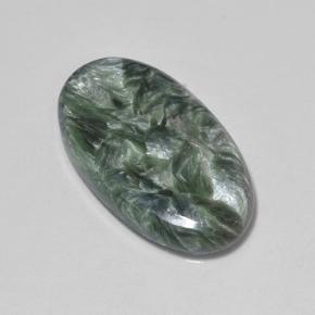 Serafinita verde natural de 7,09 ct, corte óvalo, opaco