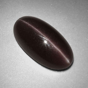 Sillimanite cat's eye marrón natural de 7,07 ct, corte óvalo, opaco