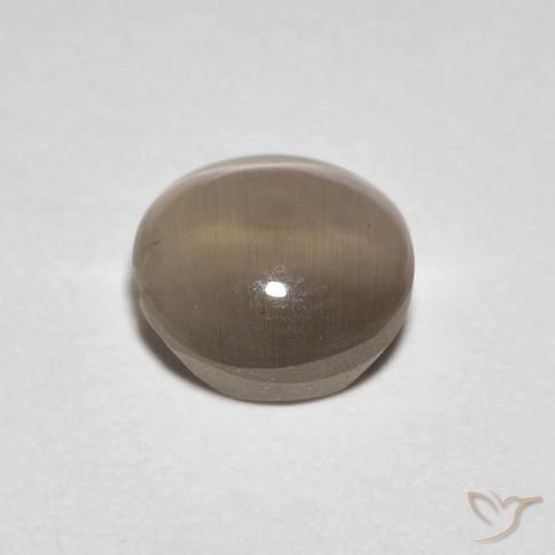 Silimanita Ojo de Gato Marrón claro cálido natural de 1.39 ct, Ovalada, Transparente