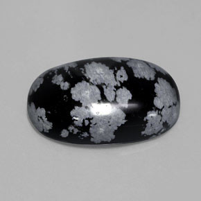 Obsidiana nevada negro natural de 13,62 ct, corte óvalo, opaco
