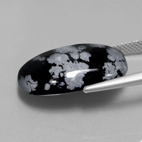 Obsidiana nevada negro natural de 13,62 ct, corte óvalo, opaco