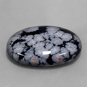 Obsidiana nevada negro natural de 22,37 ct, corte óvalo, opaco