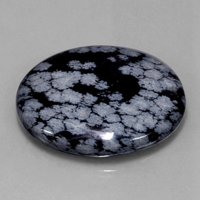Obsidiana nevada negro natural de 48,46 ct, corte óvalo, opaco