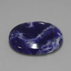 Sodalita azul natural de 37,31 ct, corte óvalo, opaco