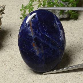 Sodalita multicolor natural de 33,58 ct, corte óvalo, opaco