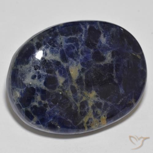 Sodalita Azul oscuro natural de 75.73 ct, Ovalada, Opaco