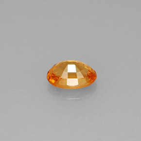 Granate espesartita naranja natural de 0,71 ct, corte óvalo, VS