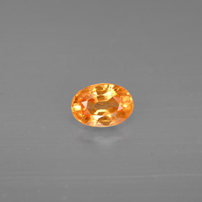 Granate espesartita naranja natural de 0,72 ct, corte óvalo, VS