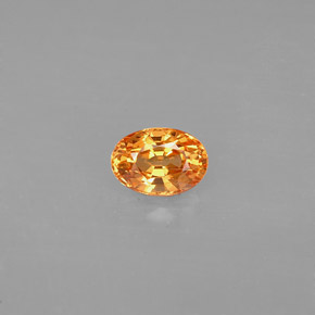 Granate espesartita naranja natural de 0,71 ct, corte óvalo, VS
