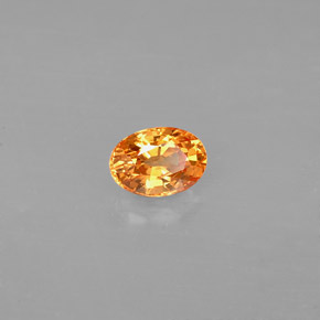 Granate espesartita naranja natural de 0,71 ct, corte óvalo, VS