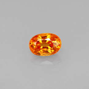 Granate espesartita naranja natural de 0,80 ct, corte óvalo, VS