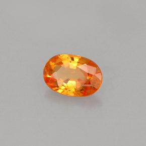 Granate espesartita naranja natural de 0,60 ct, corte óvalo, VS-SI
