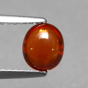 Granate espesartita naranja natural de 1,22 ct, corte óvalo, translúcido