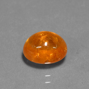 Granate espesartita naranja natural de 3,69 ct, corte óvalo, translúcido