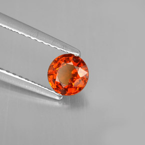 Granate espesartita naranja natural de 0,64 ct, corte redondo, VS