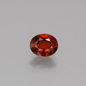 Granate espesartita naranja natural de 0,84 ct, corte óvalo, VS