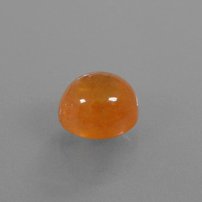 Granate espesartita naranja natural de 6,08 ct, corte óvalo, transparente