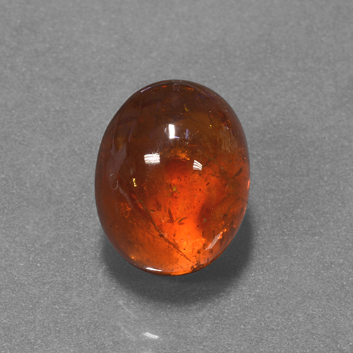 Hilo de espesartita Naranja oscuro natural de 7.05 ct, Corte Óvalo, Translúcido