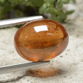 Granate espesartita naranja natural de 5,74 ct, corte óvalo, translúcido