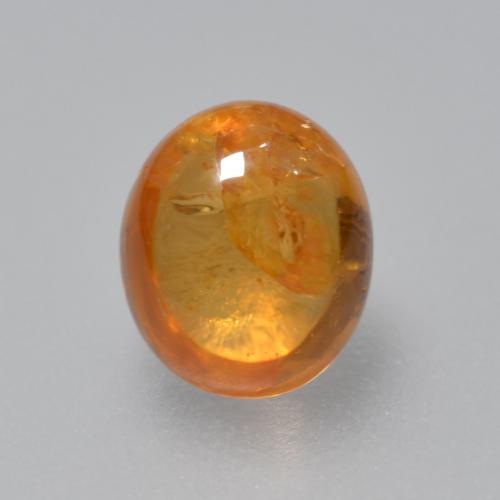 Granate espesartita naranja natural de 0,91 ct, corte óvalo, transparente