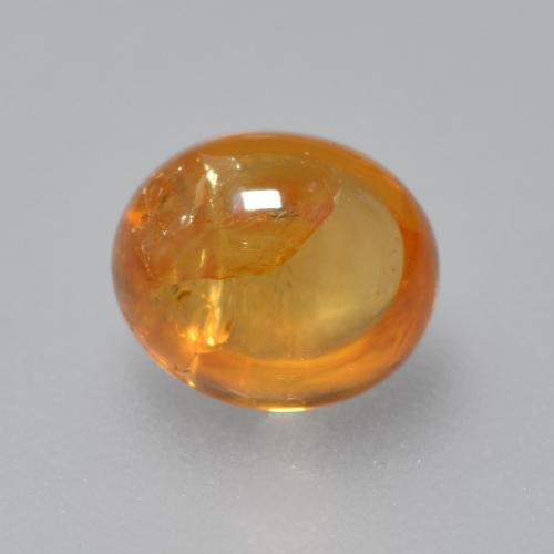 Granate espesartita naranja natural de 0,91 ct, corte óvalo, transparente
