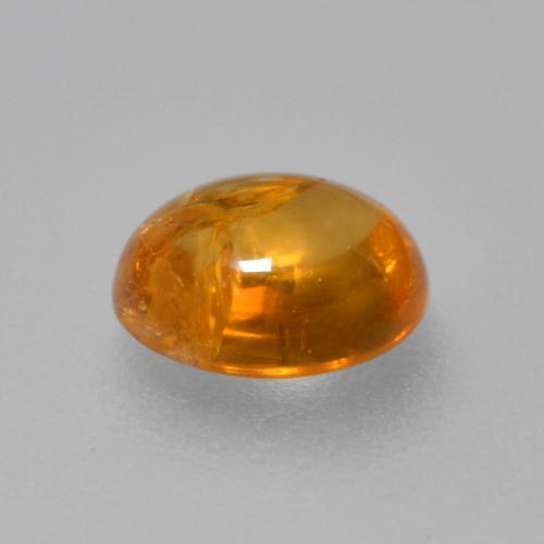 Granate espesartita naranja natural de 0,91 ct, corte óvalo, transparente