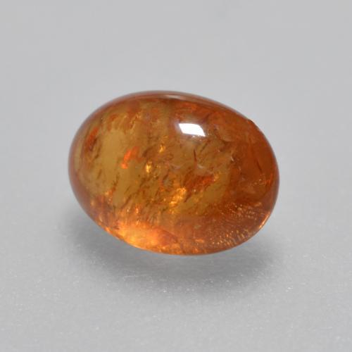 Hilo de espesartita Naranja oscuro medio natural de 1.35 ct, Corte Óvalo, Transparente