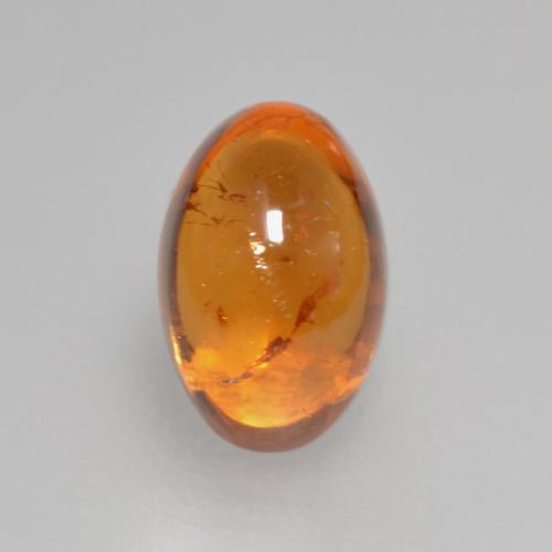 Granate espesartita naranja natural de 0,97 ct, corte óvalo, transparente