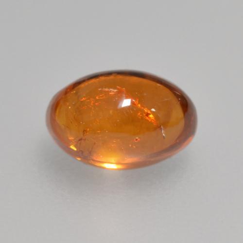 Granate espesartita naranja natural de 0,97 ct, corte óvalo, transparente
