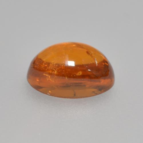 Granate espesartita naranja natural de 0,97 ct, corte óvalo, transparente