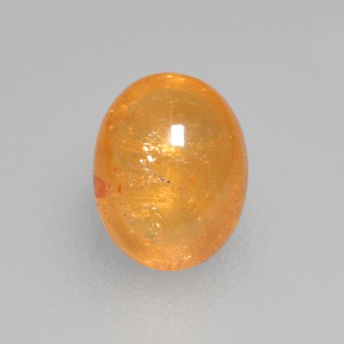 Granate espesartita naranja miel natural de 0,56 ct, corte óvalo, transparente