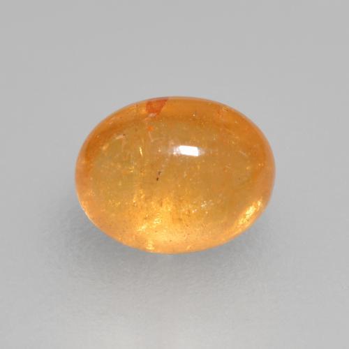 Granate espesartita naranja miel natural de 0,56 ct, corte óvalo, transparente