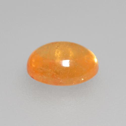 Granate espesartita naranja miel natural de 0,56 ct, corte óvalo, transparente