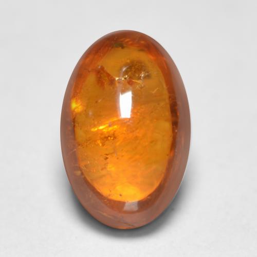 Granate espesartita naranja natural de 0,81 ct, corte óvalo, transparente