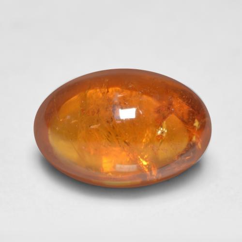 Granate espesartita naranja natural de 0,81 ct, corte óvalo, transparente
