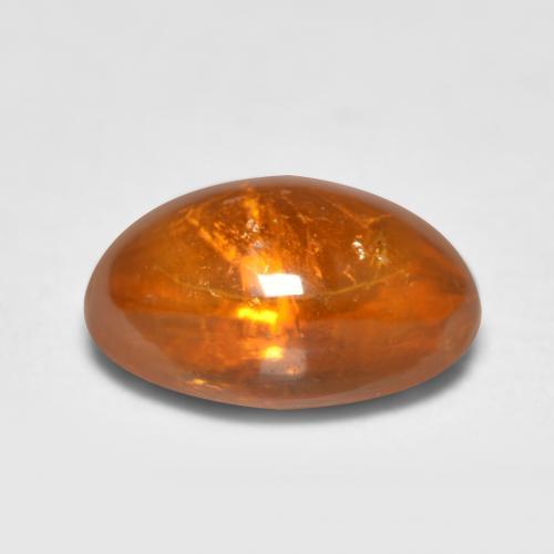 Granate espesartita naranja natural de 0,81 ct, corte óvalo, transparente