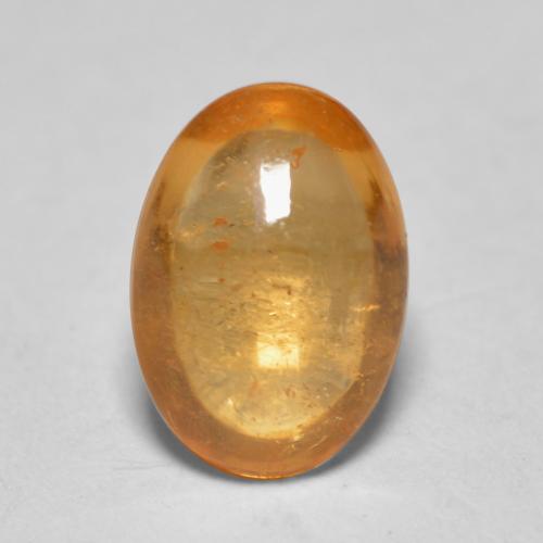 Granate espesartita naranja natural de 0,82 ct, corte óvalo, transparente