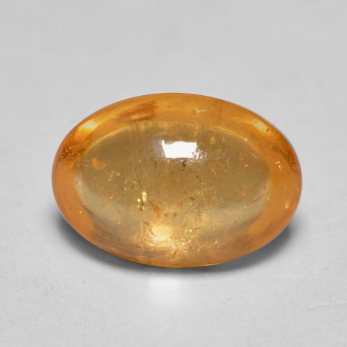 Granate espesartita naranja natural de 0,82 ct, corte óvalo, transparente