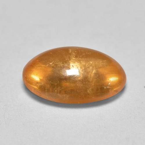 Granate espesartita naranja natural de 0,82 ct, corte óvalo, transparente