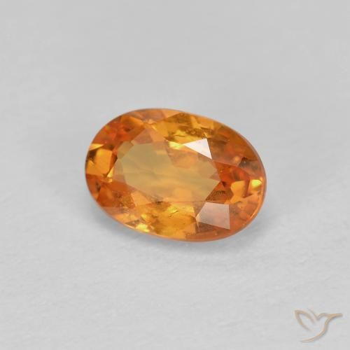 0.56ct Natural Naranja claro Hilo de espesartita, Ovalada, VS-SI